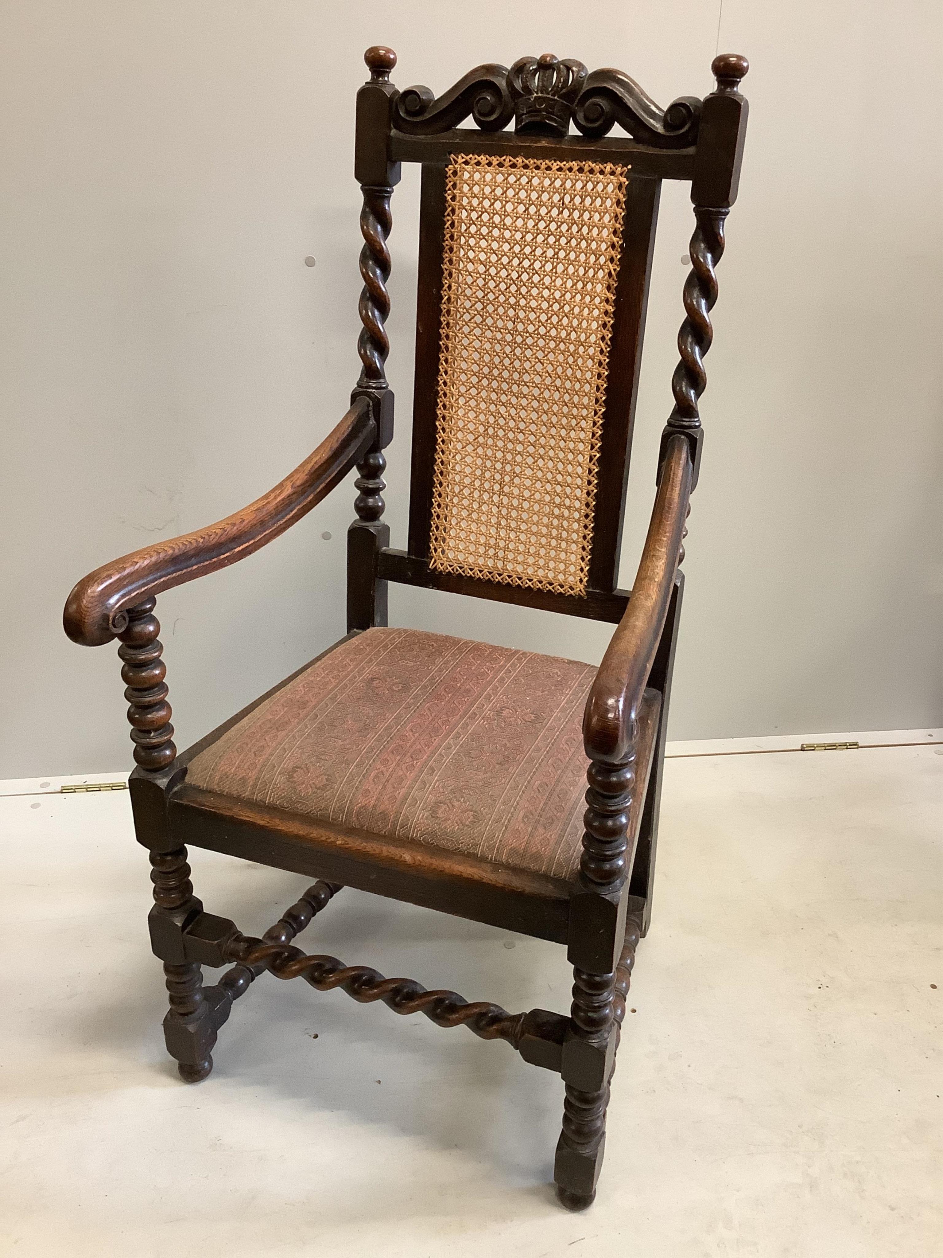 A set of eight late 19th century Carolean style carved oak caned back dining chairs, (6 single, 2 arms). Condition - fair